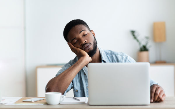 Man falling asleep because your webinar is so boring